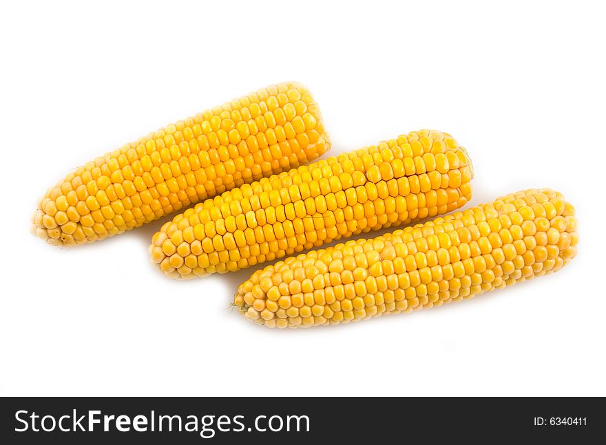 Yellow ears of corn on a white background isolated object