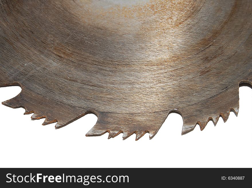 Part of a rusty circular saw blade isolated on white background