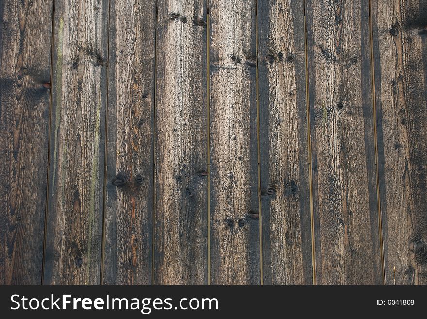 Wall built with old wooden planks