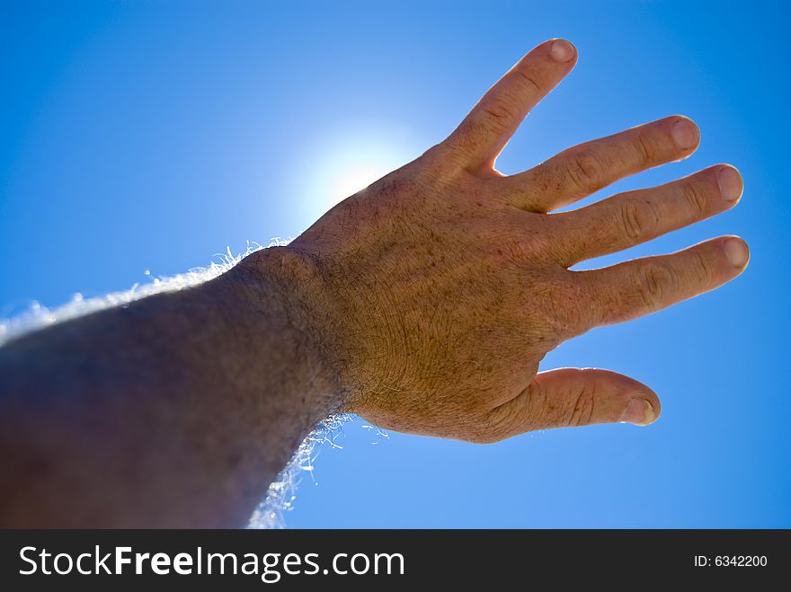 The sun covered by hand. The sun covered by hand