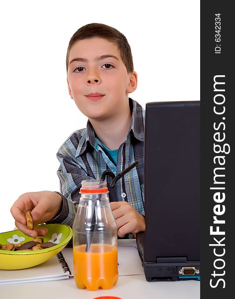 Happy smiling young boy doing studying and homework. Happy smiling young boy doing studying and homework