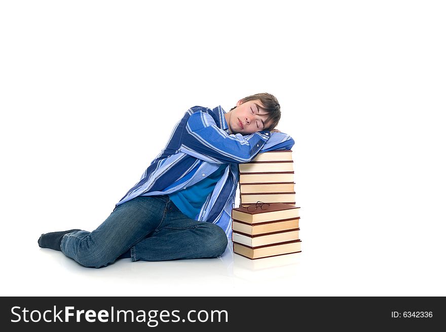Teenager schoolboy with books on white background