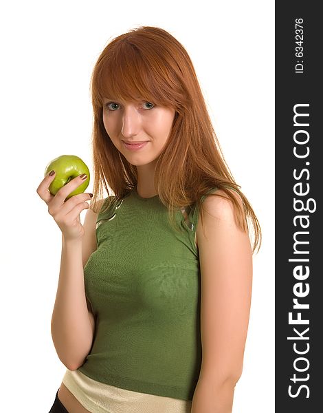 Beautiful girl with green apple isolated on white background