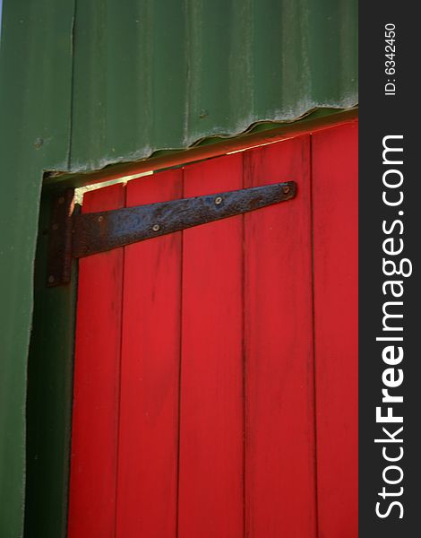 Red door, green frames, colours. Red door, green frames, colours