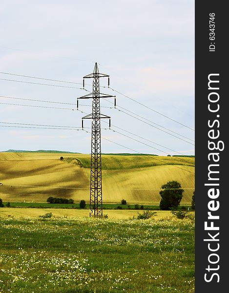 Electric pile in field in Czech republic