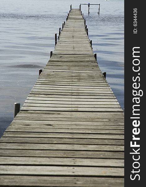 Looking down a long dock. Looking down a long dock.