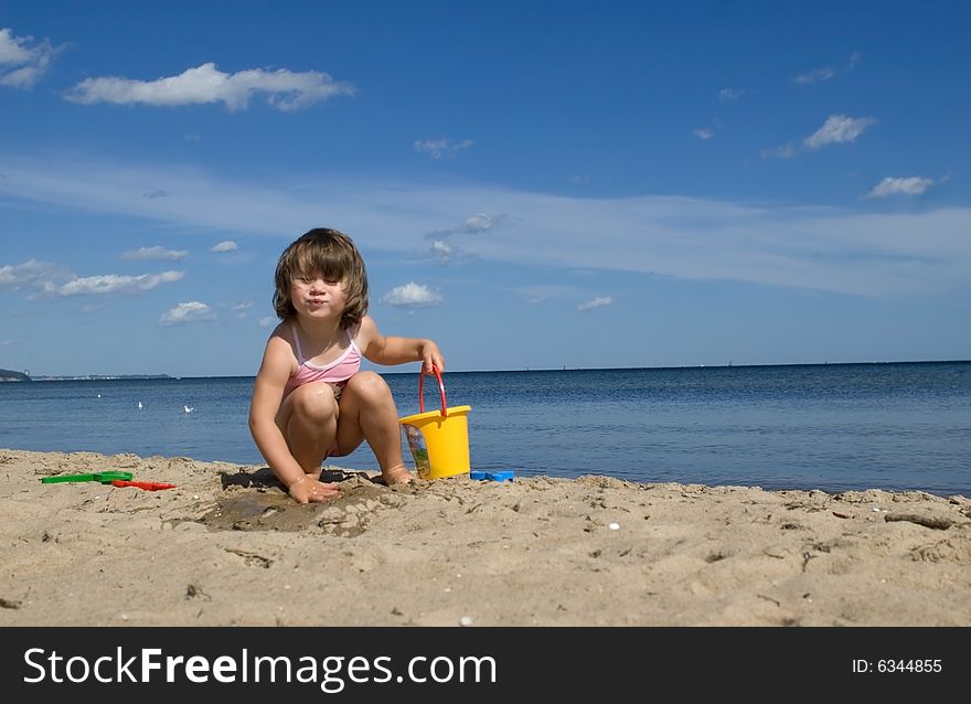 Sweet little girl on the beach. summertime. Sweet little girl on the beach. summertime
