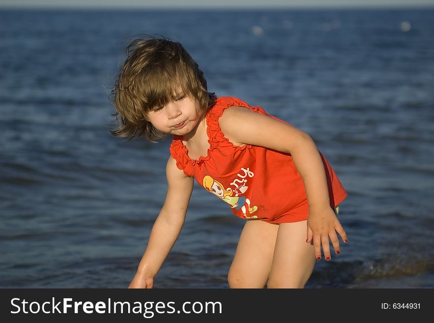 Sweet little girl on the beach. summertime. Sweet little girl on the beach. summertime