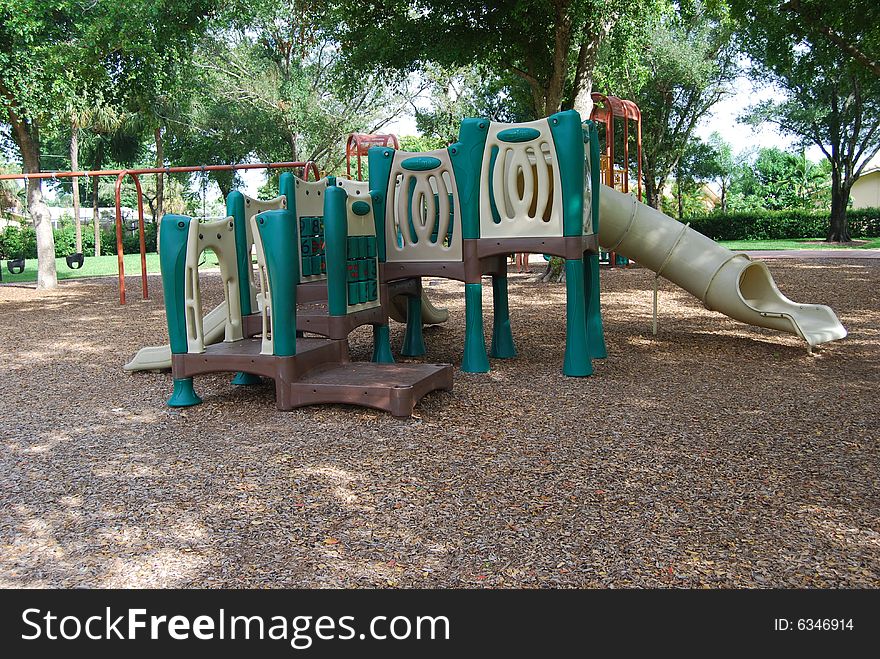 A empty plastic playground at liberty park in Plantation Florida. A empty plastic playground at liberty park in Plantation Florida