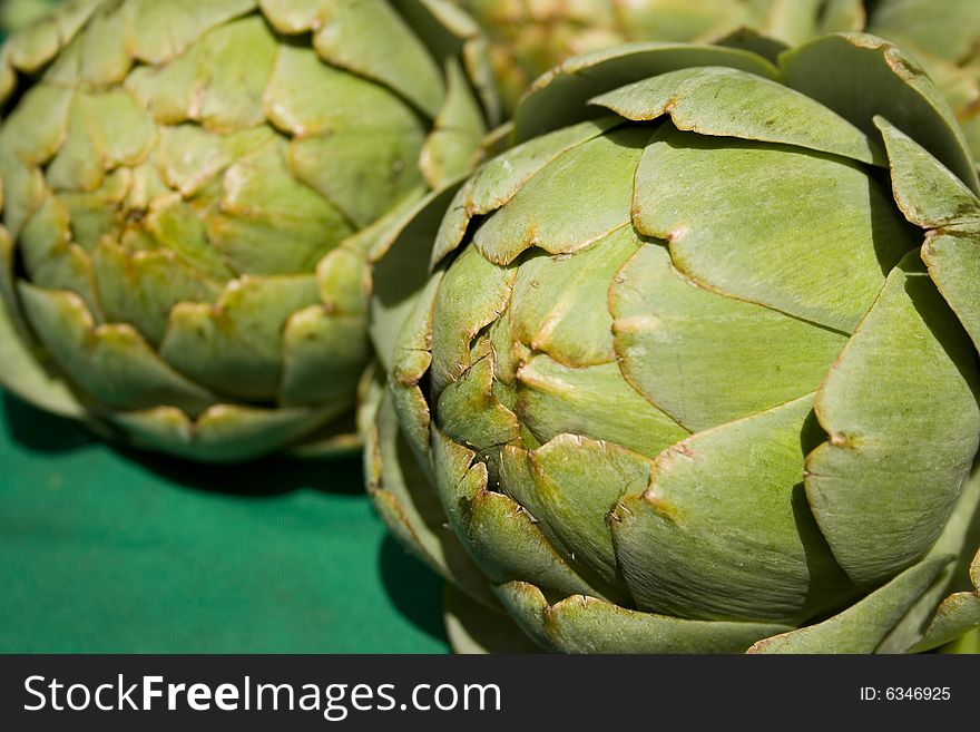 Fresh, organic artichokes for sale at farmers' market