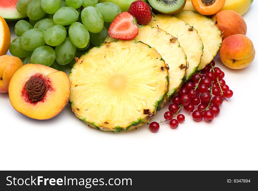 Slice fresh fruits on white background