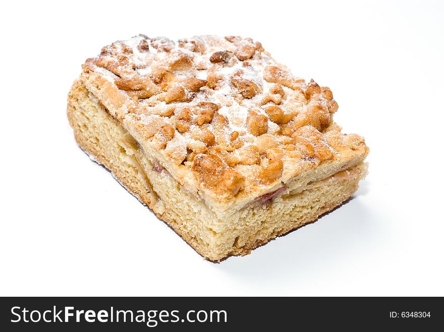 Tasty piece of apple pie at white background