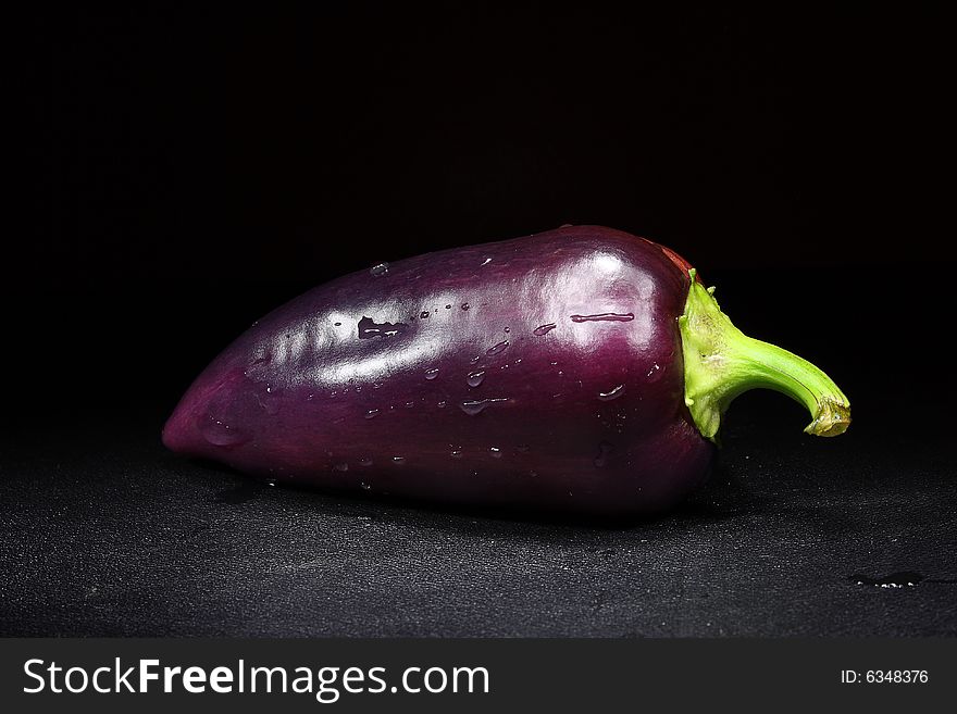 Photo vegetables pepper on a dark background