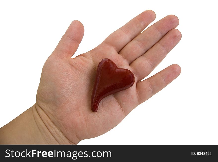 Red heart on an open palm on a white background. Red heart on an open palm on a white background
