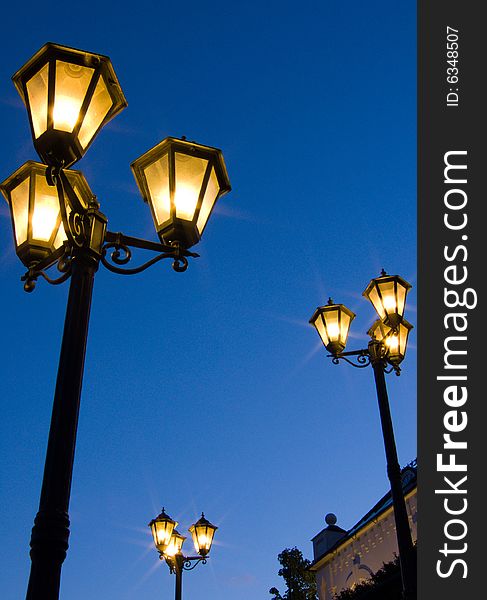 Three lanterns against the night sky. Three lanterns against the night sky