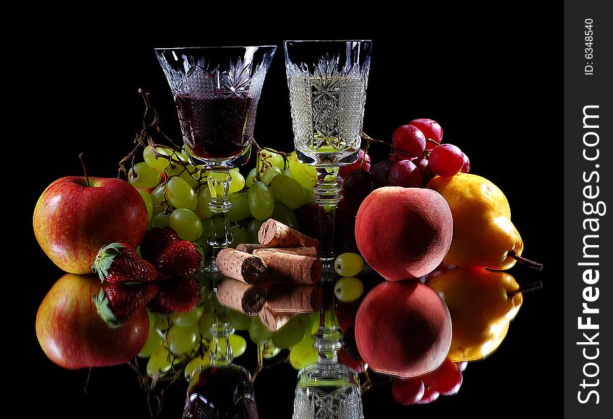 Red and white wine with fruits