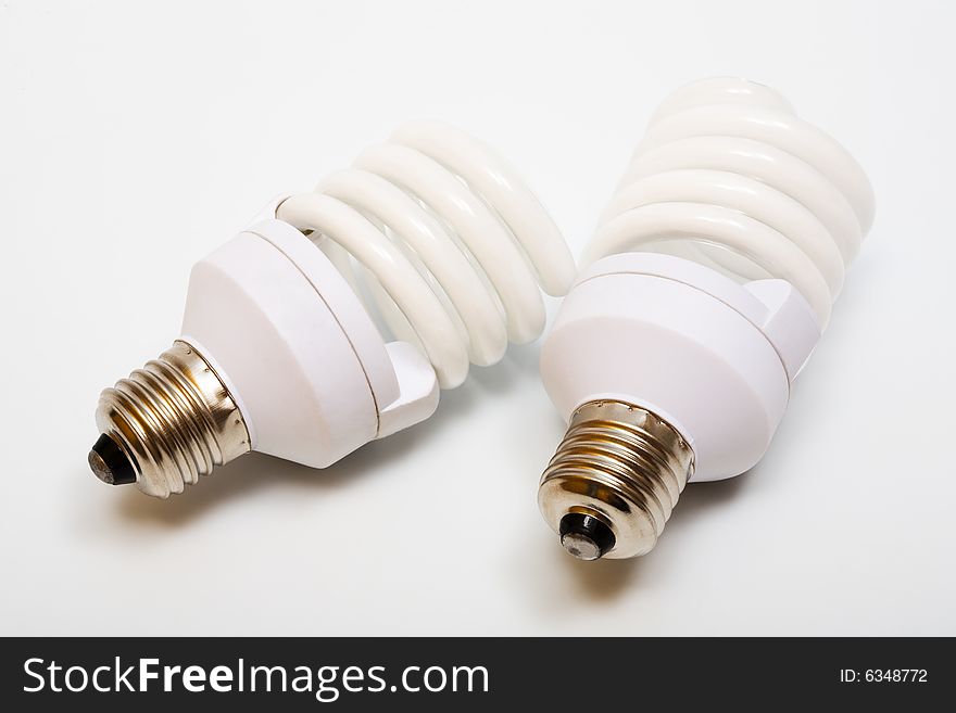 Two white and modern energy saving bulbs