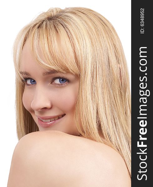 Portrait of a beautiful blonde woman with light blue eyes and natural make-up. Portrait of a beautiful blonde woman with light blue eyes and natural make-up