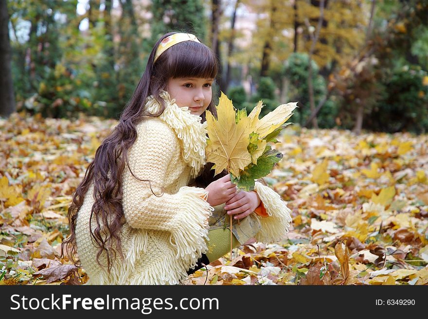 Girl In Autumn Park