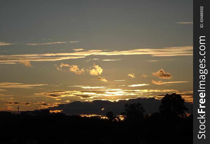 Beautful yellow sunset in a summer evening