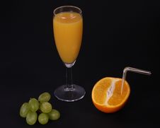 Fresh Orange Juice In Glass And Grapes Stock Image