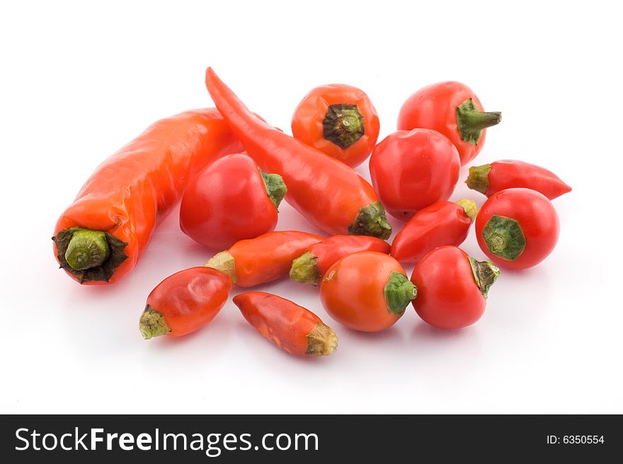 Chili peppers mix on white background