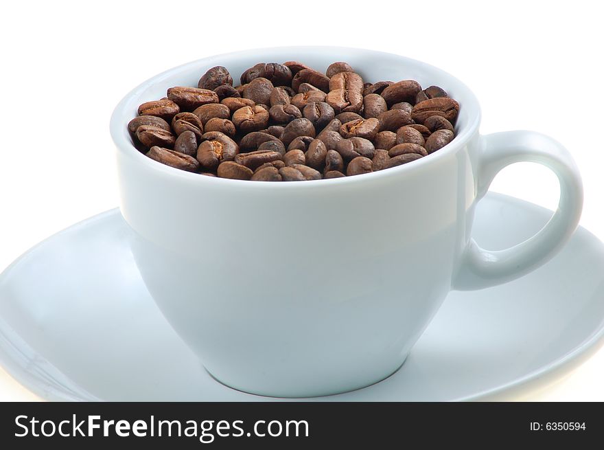 Cup of seeds of coffee. Cup of seeds of coffee