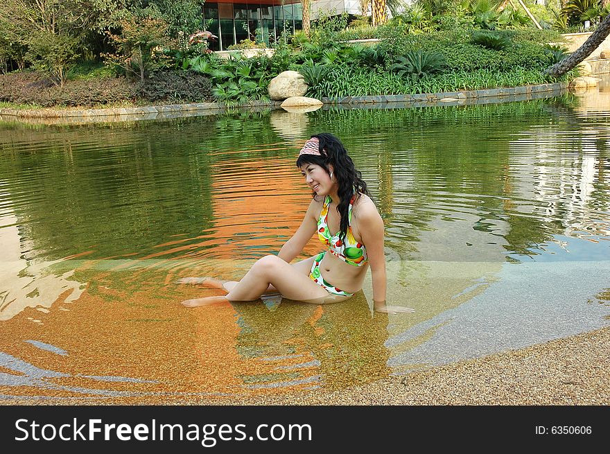 The bathing beauty in a park .