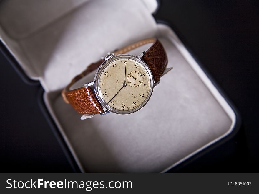 Closeup of silver old watch in box. Closeup of silver old watch in box