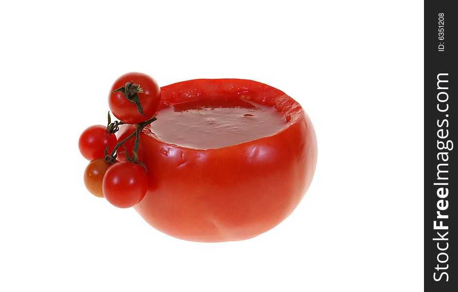 Big tomato full of juice isolated on white background