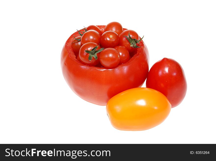 Small and big tomatoes isolated on white background
