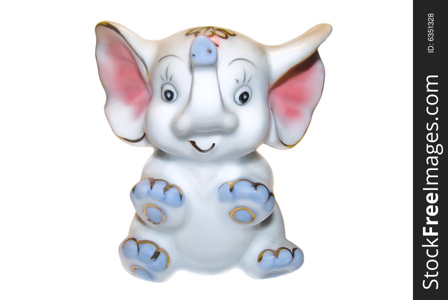 Porcelain figurine of an elephant on a white background. Porcelain figurine of an elephant on a white background