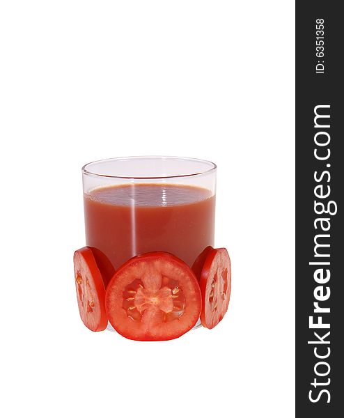 Glass full of tomato's juice and slices isolated on white background