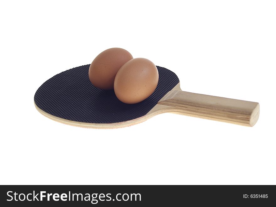 Egg on black bat isolated on white background