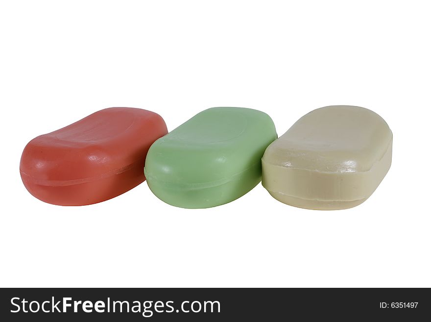 Colorful soap lying on table isolated on the white background