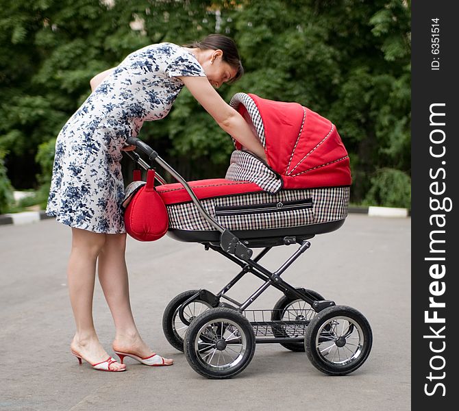 Woman With Baby Carriage