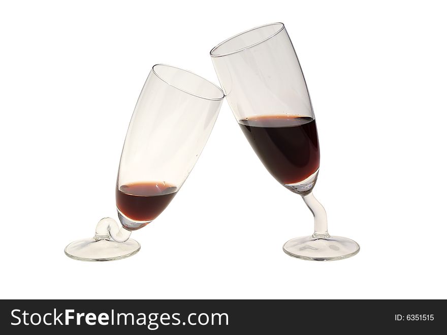 Crooked glass with wine isolated on white background. Crooked glass with wine isolated on white background