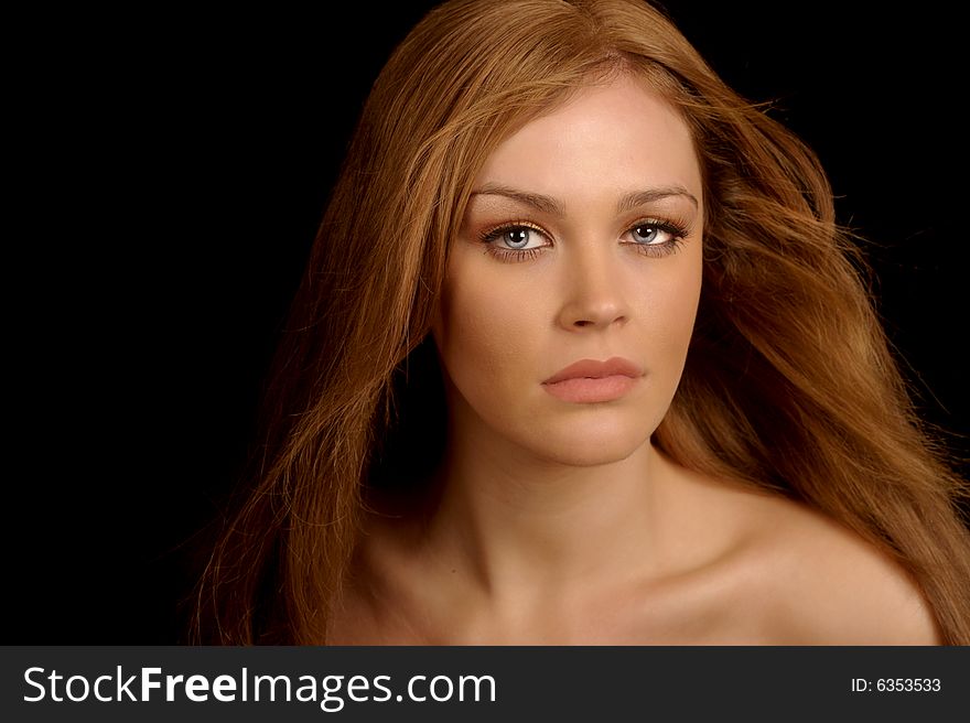 Beautiful Image of a Blond woman On Black Background. Beautiful Image of a Blond woman On Black Background