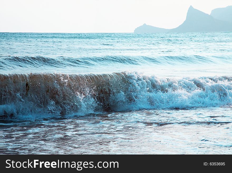 Sea waves on beach. Crimea.