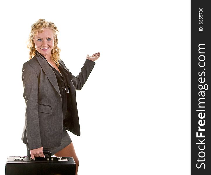 A businesswoman with curly blonde hair in a business suit carrying a briefcase and holding her hand up as if displaying or showing something. A businesswoman with curly blonde hair in a business suit carrying a briefcase and holding her hand up as if displaying or showing something