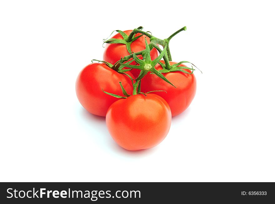 Shot of some tomatoes isolated on white