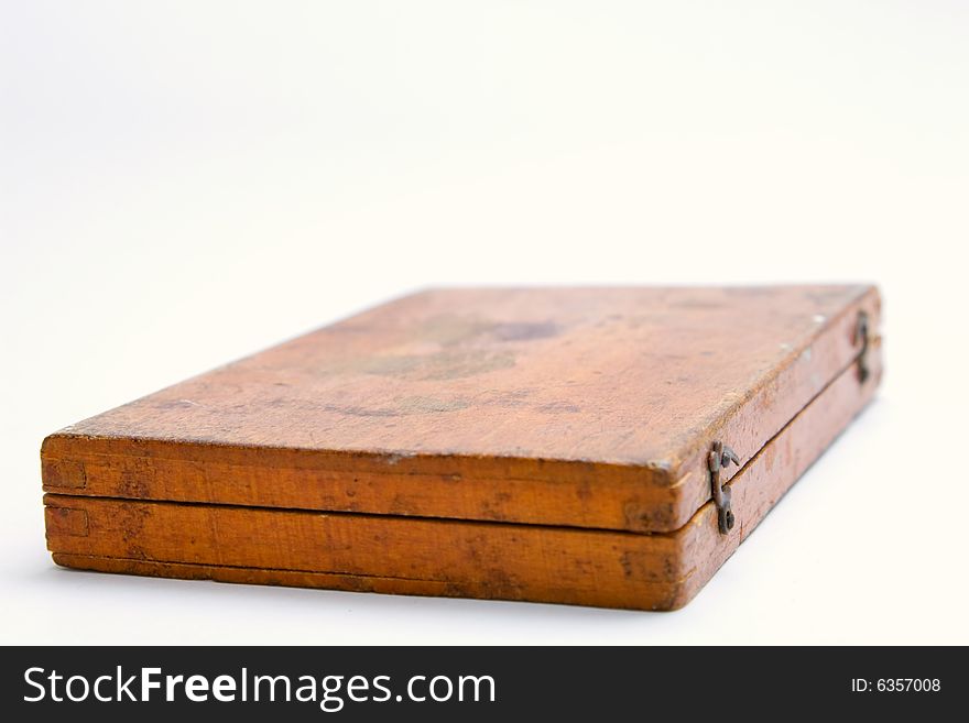 A very old wooden box on white background. A very old wooden box on white background