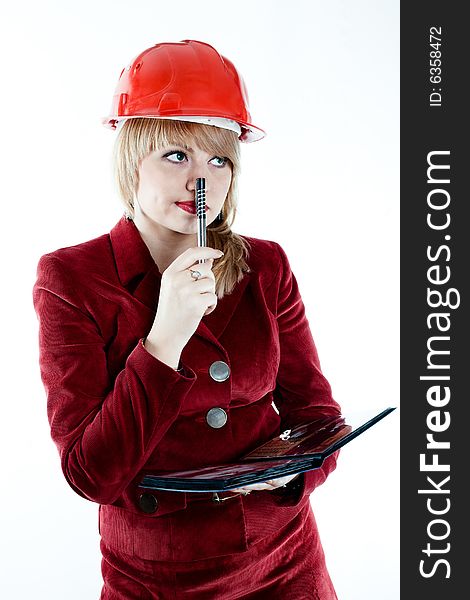 An image of a businesswoman in red helmet. An image of a businesswoman in red helmet