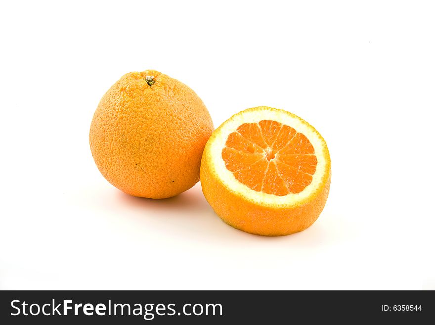 Two oranges on the white background