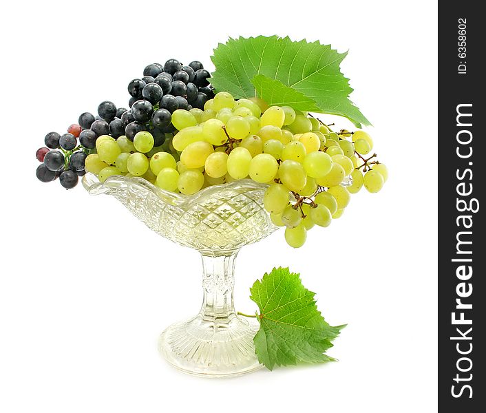 Cluster green and blue grape isolated on white
