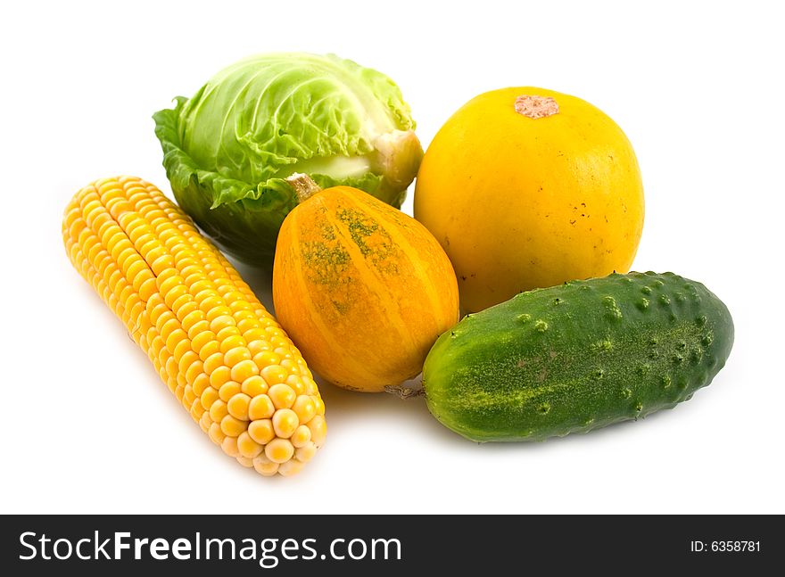 Ripe beautiful and tasty vegetables on a white background