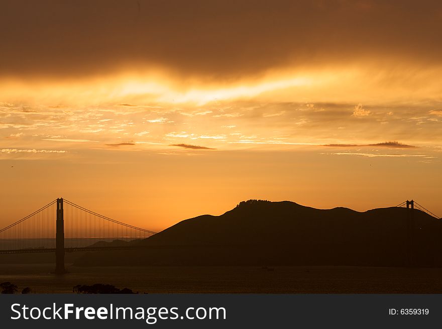 Picture of the Golden Gate Bridge during sunset photographed from Russian Hill in San Francisco. Picture of the Golden Gate Bridge during sunset photographed from Russian Hill in San Francisco