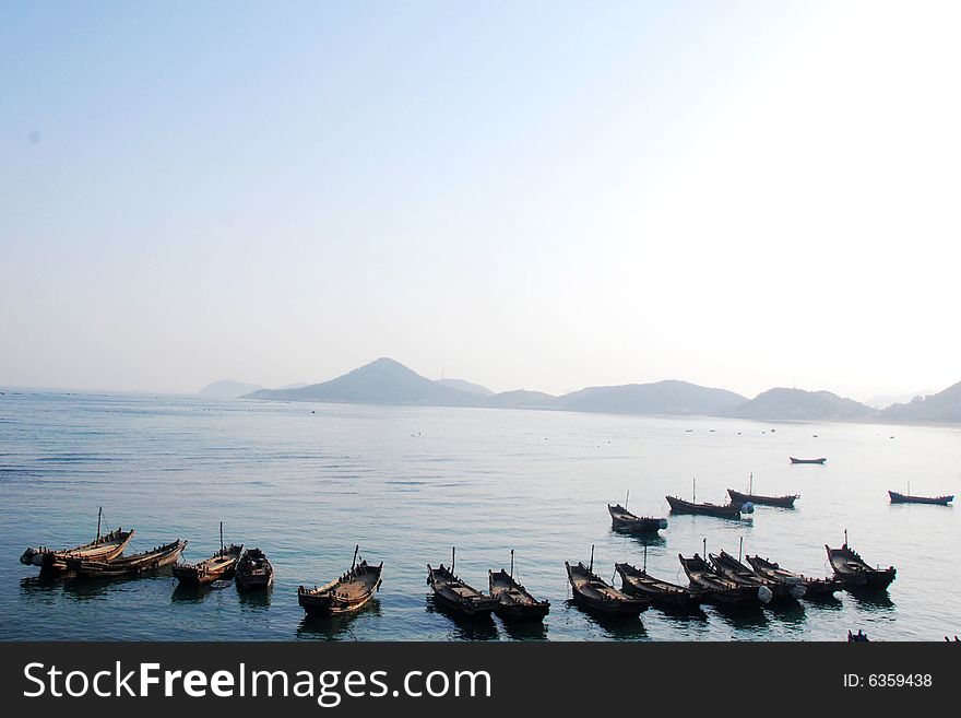 Old boats which is uesd to fish in the near sea in the orient coast. Old boats which is uesd to fish in the near sea in the orient coast