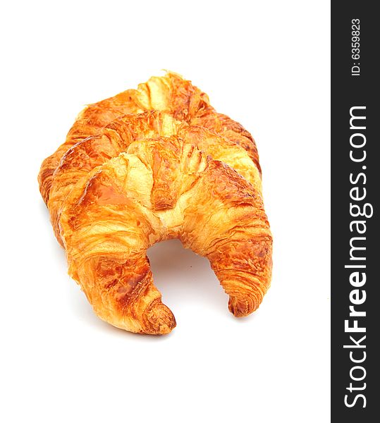 Some tasty croissants on a white background