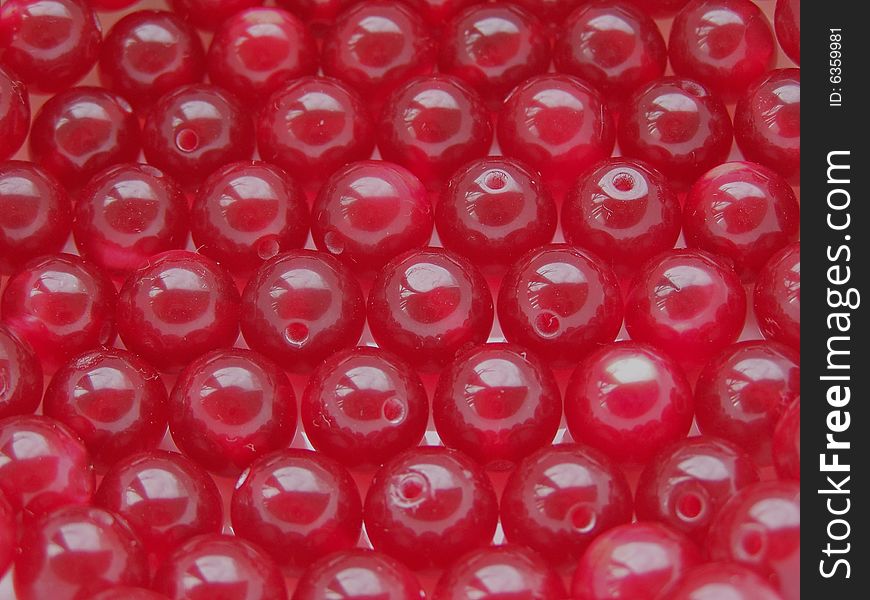 Close up of the many red beads for the background.